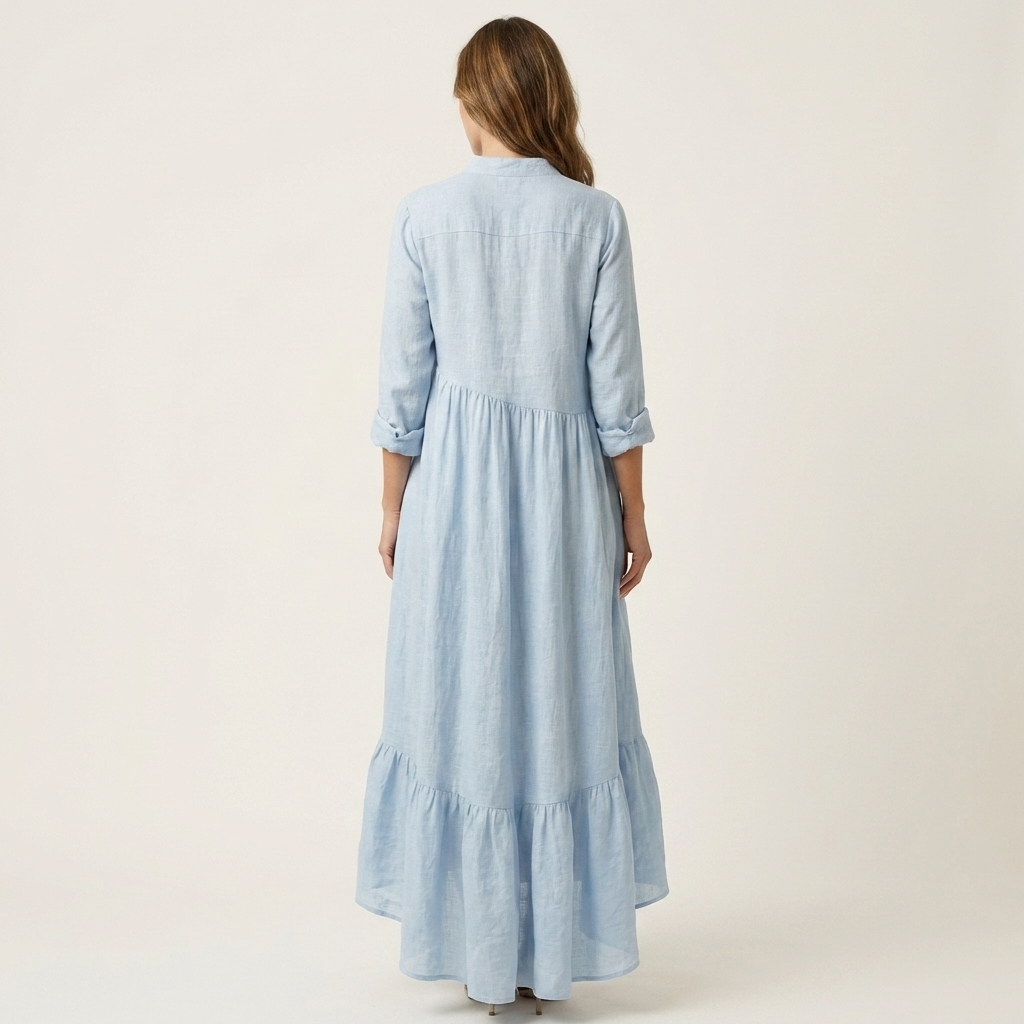 Jilana | Vestido largo con cuello alto, botones frontales y bajo de volantes