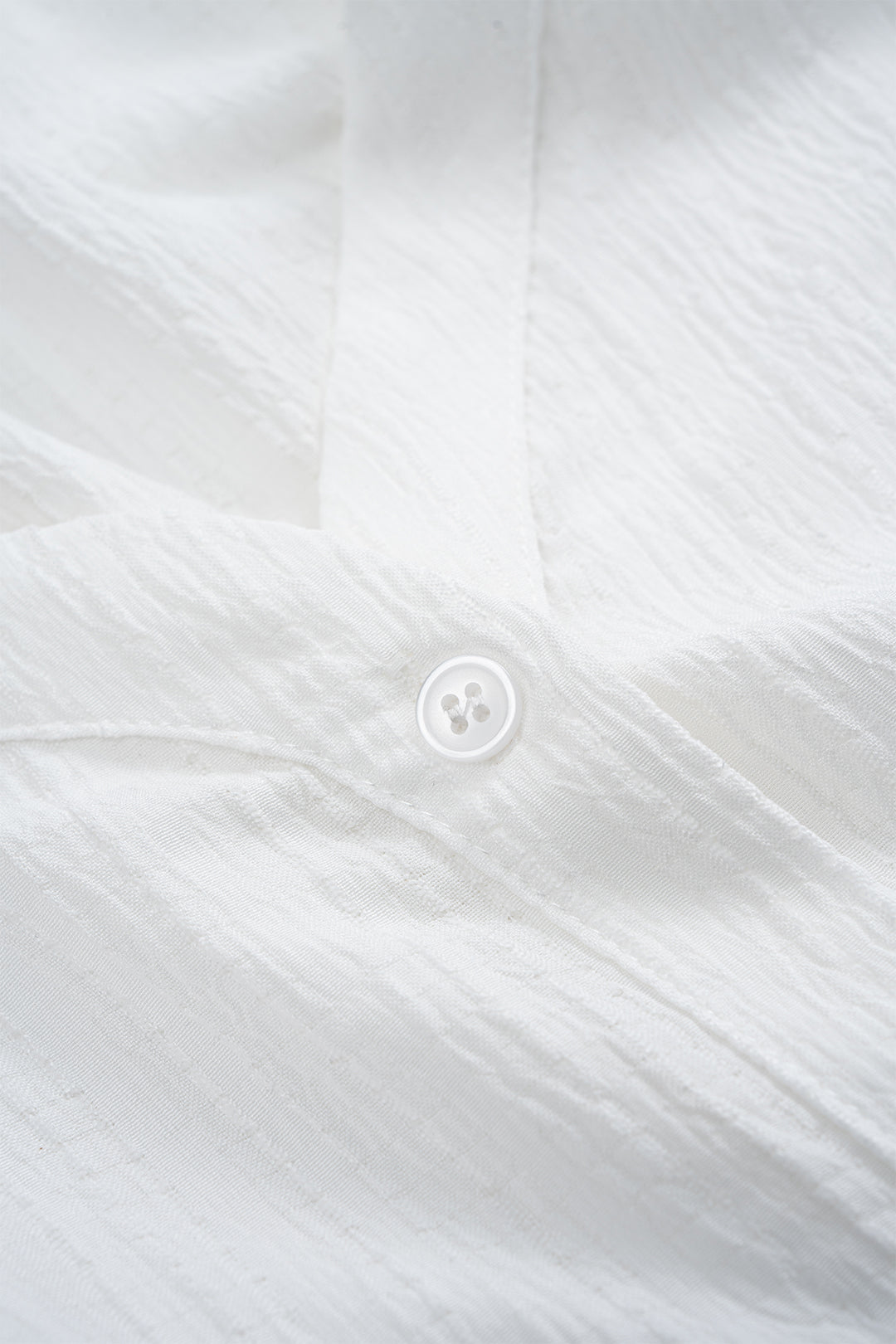 Camisa de Manga Larga Asimétrica con Espalda Descubierta