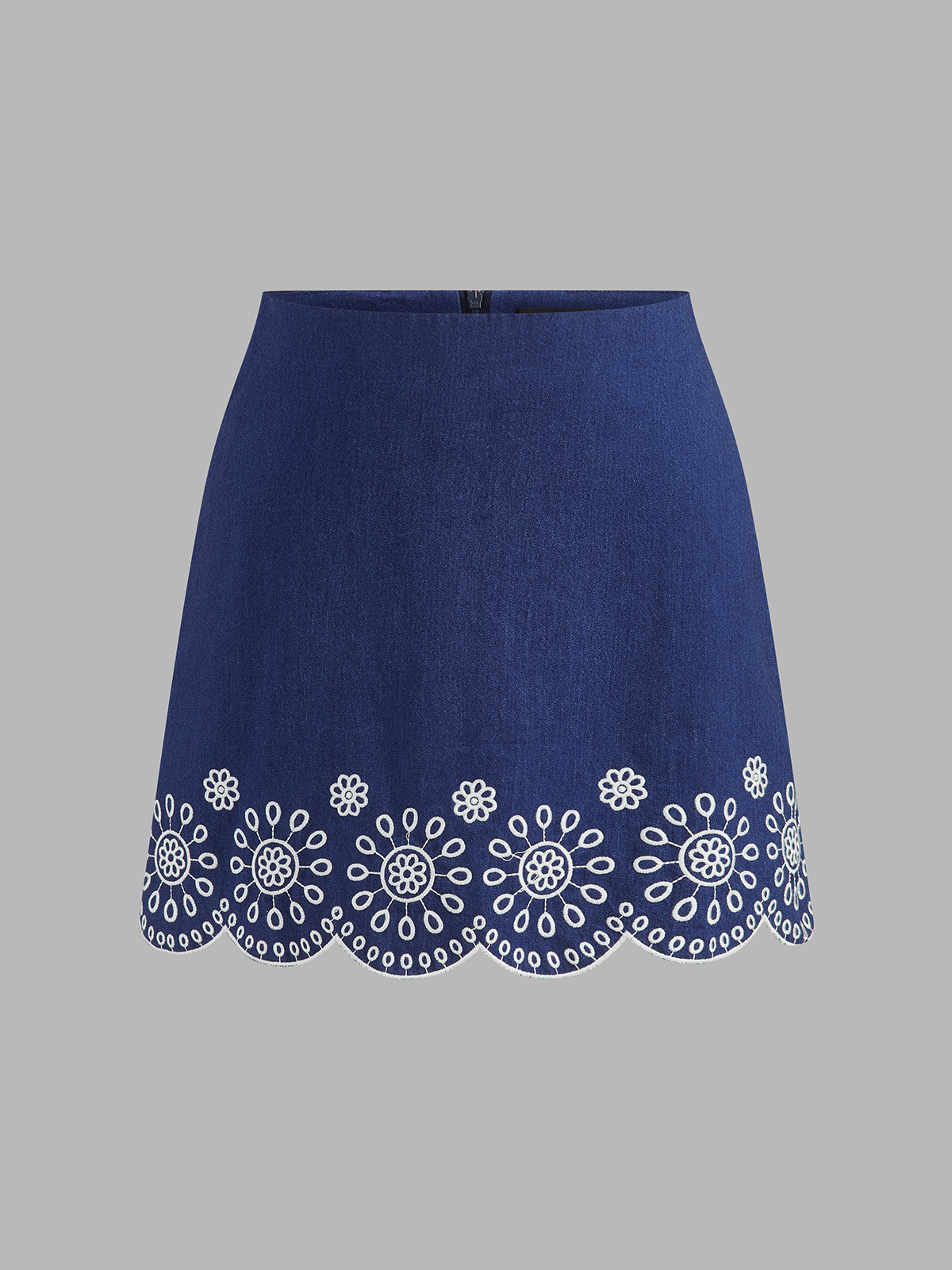 Conjunto de dos piezas con falda bordada y volantes