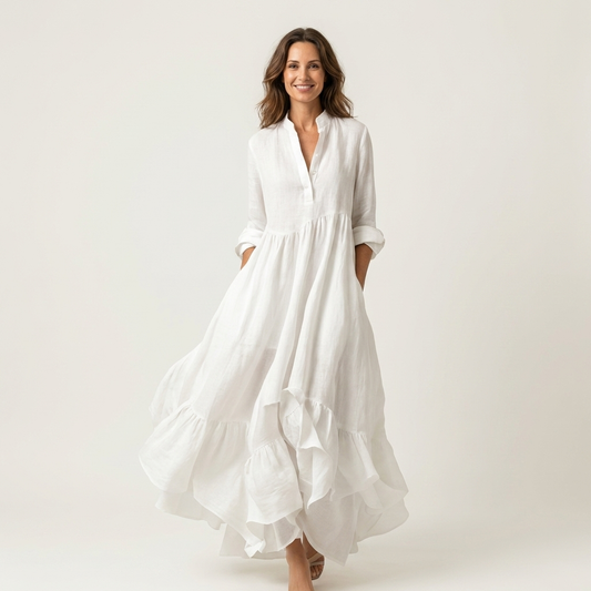 Jilana | Vestido largo con cuello alto, botones frontales y bajo de volantes